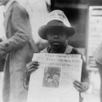 African American Boy Selling the Washington Daily News